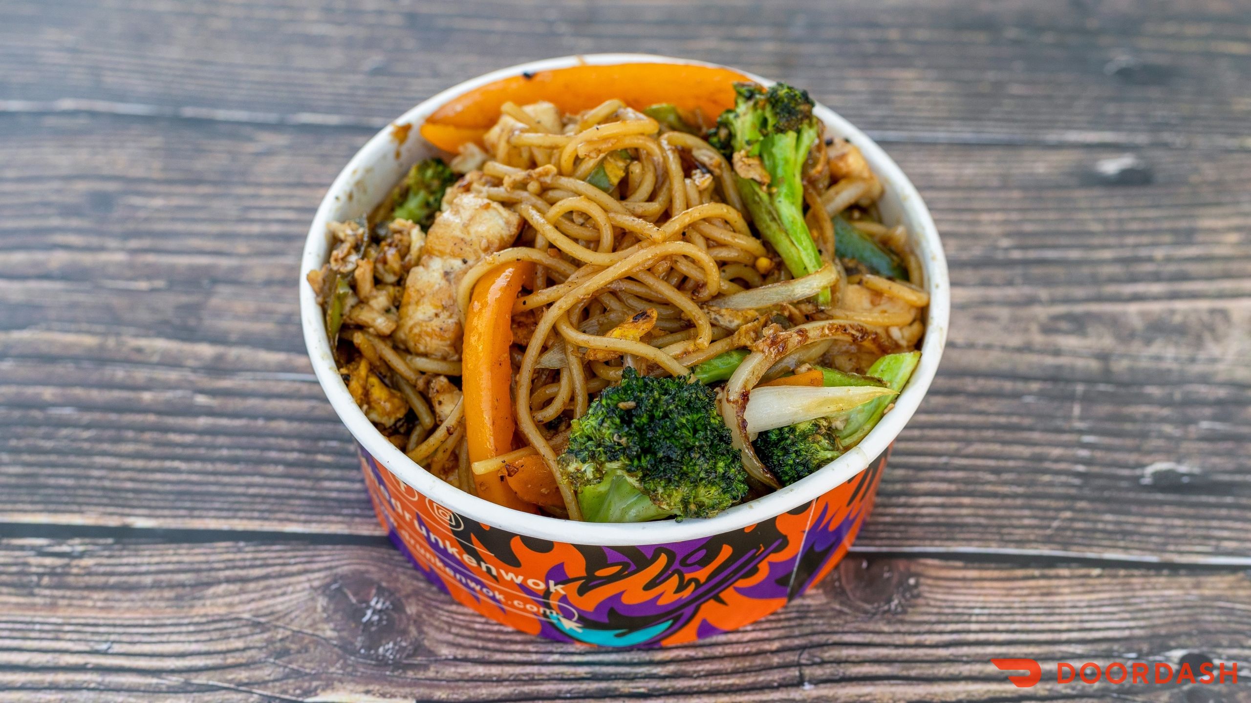 Drunken noodles with broccoli, bell peppers, onions and fresh basil at DrunkenWok St. Petersburg