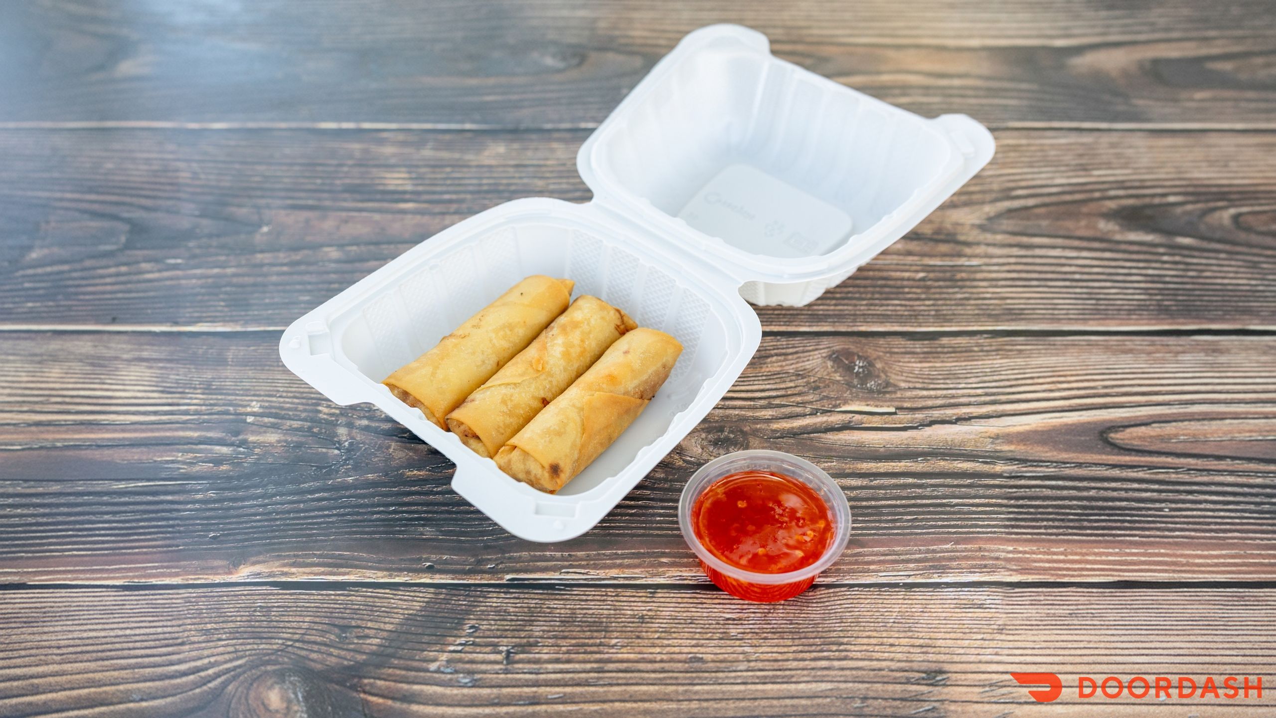 Pork spring rolls with sweet chili sauce at DrunkenWok St. Petersburg